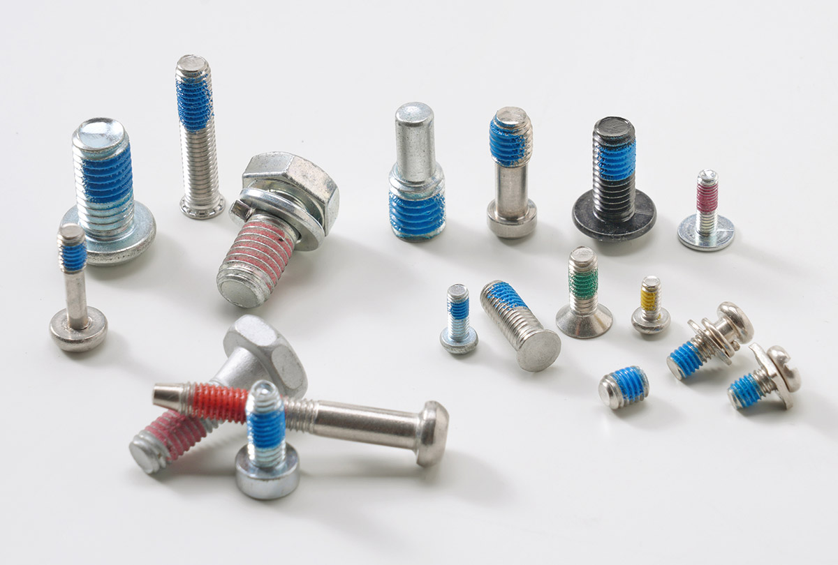 Thread-locking screws with colored coating